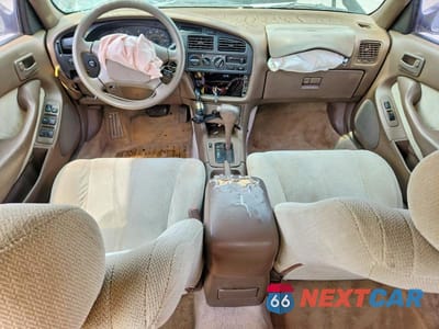 Zdjęcie 8 z 12 samochodu: 1994 TOYOTA CAMRY LE VIN:4T1SK12EXRU350447 - miniatura
