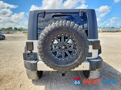 Zdjęcie 6 z 12 samochodu: 2008 JEEP WRANGLER SAHARA VIN:1J4FA54108L643749 - miniatura