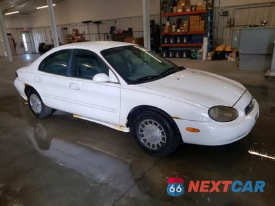 Czwarte zdjęcie samochodu z boku: 1999 MERCURY SABLE GS VIN:1MEFM50U8XA623240 - miniatura