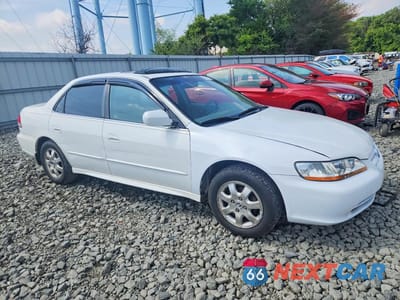 Czwarte zdjęcie samochodu z boku: 2001 HONDA ACCORD EX VIN:JHMCG668X1C021106 - miniatura