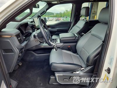 Zdjęcie 7 z 12 samochodu: 2023 FORD F150 LIGHTNING PRO VIN:1FT6W1EV8PWG48146 - miniatura