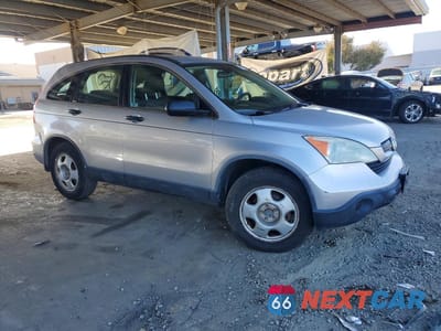 Czwarte zdjęcie samochodu z boku: 2009 HONDA CR-V LX VIN:JHLRE48399C018591 - miniatura
