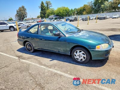 Czwarte zdjęcie samochodu z boku: 1997 MITSUBISHI MIRAGE LS VIN:JA3AY31C2VU000216 - miniatura