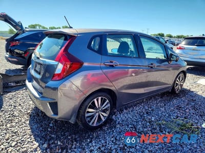Trzecie zdjęcie samochodu z tyłu: 2016 HONDA FIT EX VIN:JHMGK5H71GS002893 - miniatura