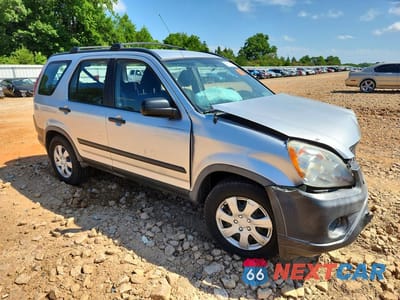 Czwarte zdjęcie samochodu z boku: 2006 HONDA CR-V LX VIN:JHLRD78536C042712 - miniatura