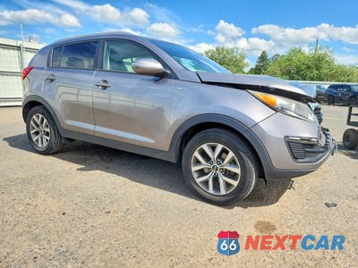 Czwarte zdjęcie samochodu z boku: 2014 KIA SPORTAGE LX VIN:KNDPBCAC3E7658493 - miniatura