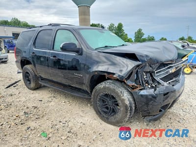 Czwarte zdjęcie samochodu z boku: 2011 CHEVROLET TAHOE K1500 LT VIN:1GNSKBE05BR255417 - miniatura