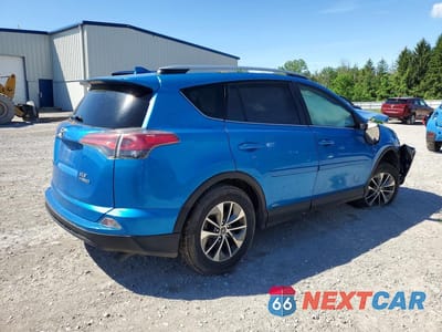 Trzecie zdjęcie samochodu z tyłu: 2018 TOYOTA RAV4 HYBRID XLE VIN:JTMRJREV5JD225232 - miniatura