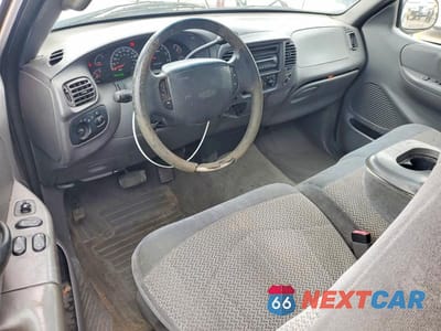 Zdjęcie 8 z 13 samochodu: 2000 FORD F150 VIN:1FTRX18WXYNC28359 - miniatura