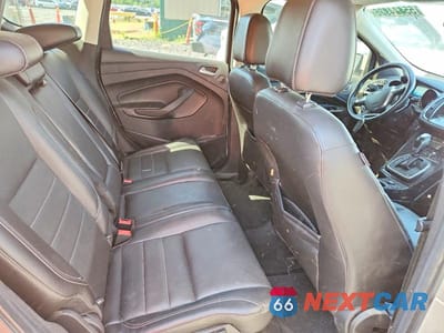 Zdjęcie 11 z 13 samochodu: 2014 FORD ESCAPE TITANIUM VIN:1FMCU9J92EUB59021 - miniatura