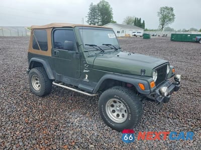 Czwarte zdjęcie samochodu z boku: 1998 JEEP WRANGLER / TJ SPORT VIN:1J4FY19S9WP786680 - miniatura