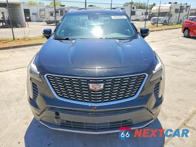 Piąte zdjęcie samochodu w środku: 2022 CADILLAC XT4 PREMIUM LUXURY VIN:1GYFZDR49NF100125 - miniatura