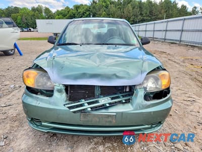Piąte zdjęcie samochodu w środku: 2005 HYUNDAI ACCENT GL VIN:KMHCG45C35U622607 - miniatura