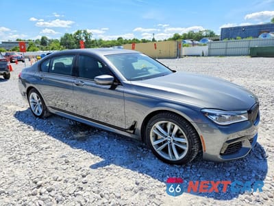 Czwarte zdjęcie samochodu z boku: 2017 BMW 750 XI VIN:WBA7F2C53HG421811 - miniatura