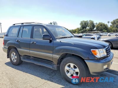 Czwarte zdjęcie samochodu z boku: 1999 TOYOTA LAND CRUISER BASE VIN:JT3HT05J2X0069086 - miniatura
