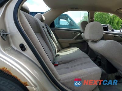 Zdjęcie 10 z 12 samochodu: 2001 TOYOTA CAMRY LE VIN:4T1BG22K01U851980 - miniatura