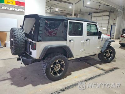 Trzecie zdjęcie samochodu z tyłu: 2013 JEEP WRANGLER UNLIMITED SAHARA VIN:1C4BJWEG1DL601775 - miniatura