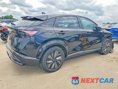 Trzecie zdjęcie samochodu z tyłu: 2024 NISSAN ARIYA EVOLVE+ E-4ORCE VIN:JN1DF0BB7RM730611 - miniatura