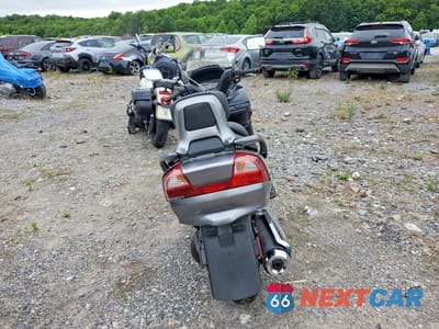 Czwarte zdjęcie samochodu z boku: 2006 SUZUKI AN400 K3 VIN:JS1CK43AX62102125 - miniatura