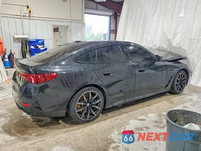 Trzecie zdjęcie samochodu z tyłu: 2026 BMW M440I GRAN COUPE VIN:WBA53FB08TFV96325 - miniatura