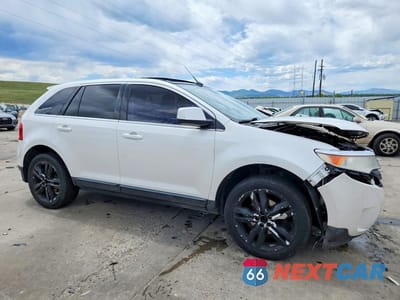 Czwarte zdjęcie samochodu z boku: 2011 FORD EDGE LIMITED VIN:2FMDK3KC6BBA61466 - miniatura