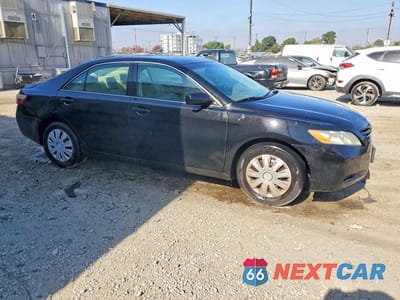 Czwarte zdjęcie samochodu z boku: 2009 TOYOTA CAMRY LE V6 VIN:4T1BK46K69U588040 - miniatura