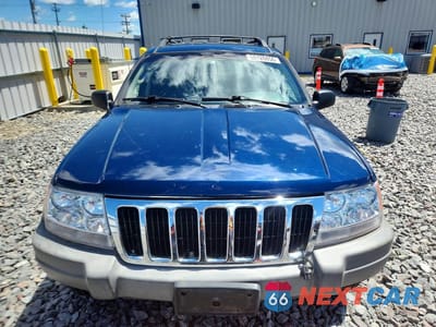 Piąte zdjęcie samochodu w środku: 2002 JEEP GRAND CHEROKEE LAREDO VIN:1J4GW48S32C286691 - miniatura