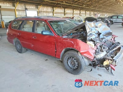 Czwarte zdjęcie samochodu z boku: 1993 TOYOTA CAMRY LE VIN:4T1SK12W5PU164823 - miniatura