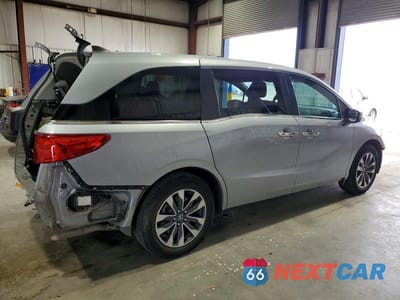 Trzecie zdjęcie samochodu z tyłu: 2021 HONDA ODYSSEY EXL VIN:5FNRL6H7XMB003109 - miniatura
