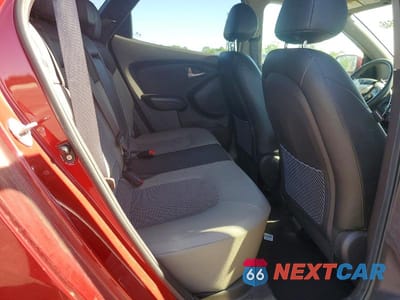 Zdjęcie 11 z 13 samochodu: 2012 HYUNDAI TUCSON GLS VIN:KM8JUCAC0CU456138 - miniatura