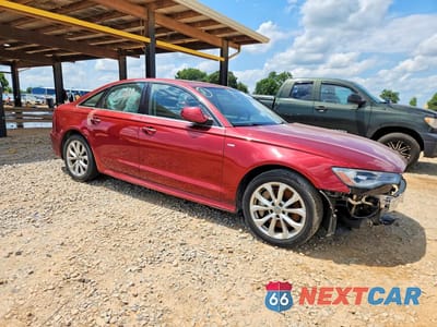 Czwarte zdjęcie samochodu z boku: 2018 AUDI A6 PREMIUM VIN:WAUF8AFC1JN050854 - miniatura