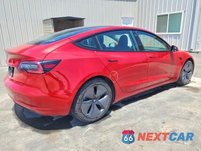 Trzecie zdjęcie samochodu z tyłu: 2022 TESLA MODEL 3 VIN:5YJ3E1EA6NF190675 - miniatura