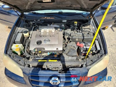 Zdjęcie 11 z 12 samochodu: 2002 NISSAN MAXIMA GXE VIN:JN1DA31D02T452844 - miniatura