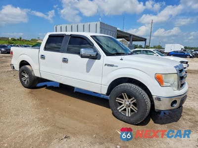 Czwarte zdjęcie samochodu z boku: 2013 FORD F150 SUPERCREW VIN:1FTFW1CF1DFA93418 - miniatura