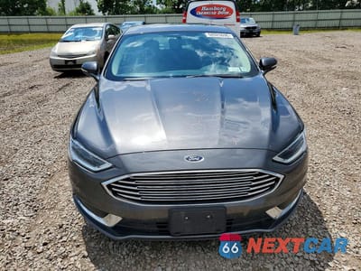 Piąte zdjęcie samochodu w środku: 2018 FORD FUSION SE VIN:3FA6P0HD9JR244461 - miniatura