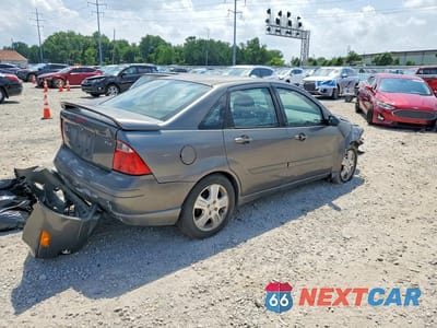Trzecie zdjęcie samochodu z tyłu: 2005 FORD FOCUS VIN:1FAFP38Z95W132632 - miniatura