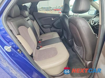 Zdjęcie 11 z 13 samochodu: 2013 HYUNDAI TUCSON VIN:KM8JUCAC5DU696349 - miniatura