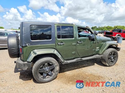 Trzecie zdjęcie samochodu z tyłu: 2007 JEEP WRANGLER SAHARA VIN:1J4GA59107L198750 - miniatura