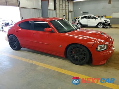 Czwarte zdjęcie samochodu z boku: 2007 DODGE CHARGER SRT-8 VIN:2B3KA73W67H685479 - miniatura