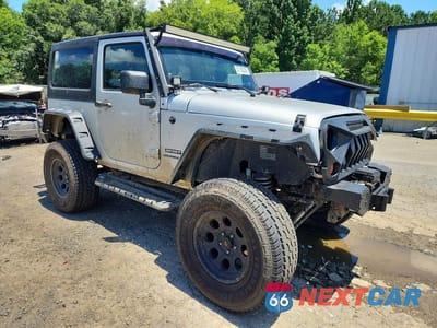 Czwarte zdjęcie samochodu z boku: 2012 JEEP WRANGLER SPORT VIN:1C4AJWAG8CL149758 - miniatura