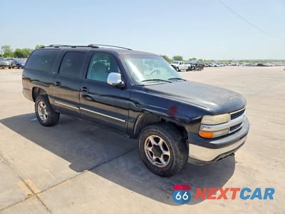 Czwarte zdjęcie samochodu z boku: 2001 CHEVROLET SUBURBAN K1500 VIN:3GNFK16T01G285069 - miniatura