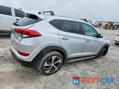 Trzecie zdjęcie samochodu z tyłu: 2018 HYUNDAI TUCSON LIMITED VIN:KM8J33A25JU694770 - miniatura