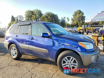 Czwarte zdjęcie samochodu z boku: 2002 TOYOTA RAV4 BASE VIN:JTEGH20V226001323 - miniatura