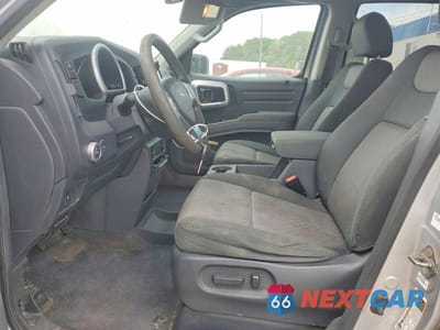 Zdjęcie 7 z 13 samochodu: 2006 HONDA RIDGELINE RTS VIN:2HJYK16416H571994 - miniatura