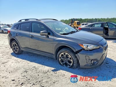 Czwarte zdjęcie samochodu z boku: 2021 SUBARU CROSSTREK PREMIUM VIN:JF2GTAECXM8322121 - miniatura