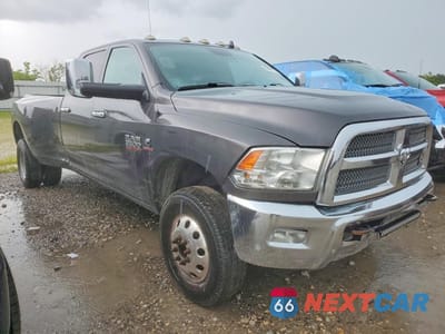 Czwarte zdjęcie samochodu z boku: 2018 RAM 3500 SLT VIN:3C63RRHL7JG330700 - miniatura