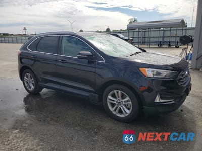 Czwarte zdjęcie samochodu z boku: 2020 FORD EDGE SEL VIN:2FMPK4J94LBB16099 - miniatura
