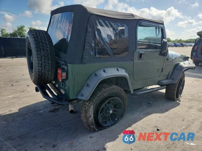 Trzecie zdjęcie samochodu z tyłu: 1999 JEEP WRANGLER / TJ SE VIN:1J4FY29P4XP460448 - miniatura