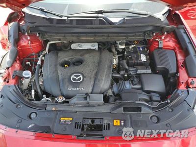 Zdjęcie 12 z 13 samochodu: 2021 MAZDA CX-5 TOURING VIN:JM3KFACM9M1382175 - miniatura