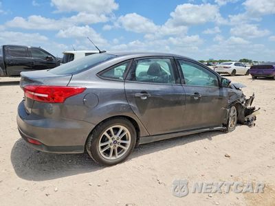 Trzecie zdjęcie samochodu z tyłu: 2016 FORD FOCUS SE VIN:1FADP3F2XGL256698 - miniatura